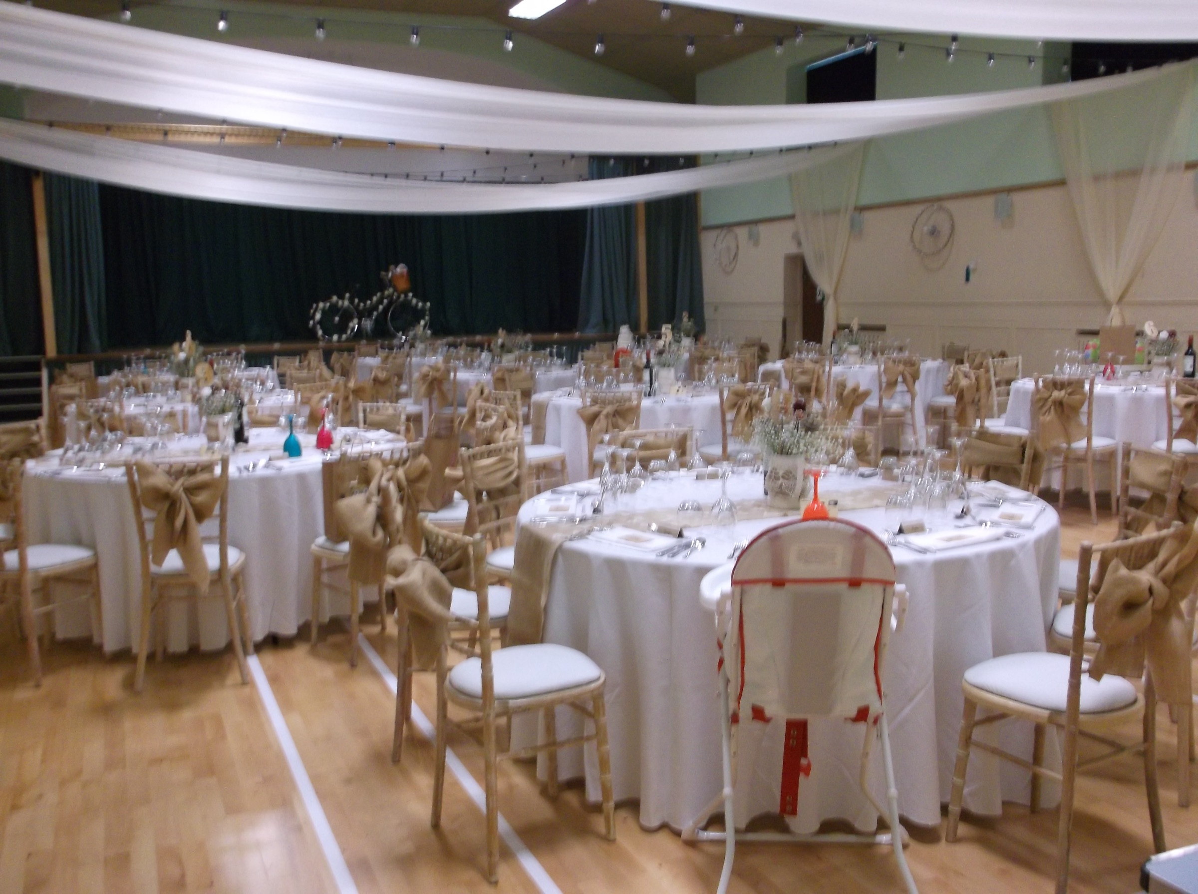 Reception with fairy lights and round tables