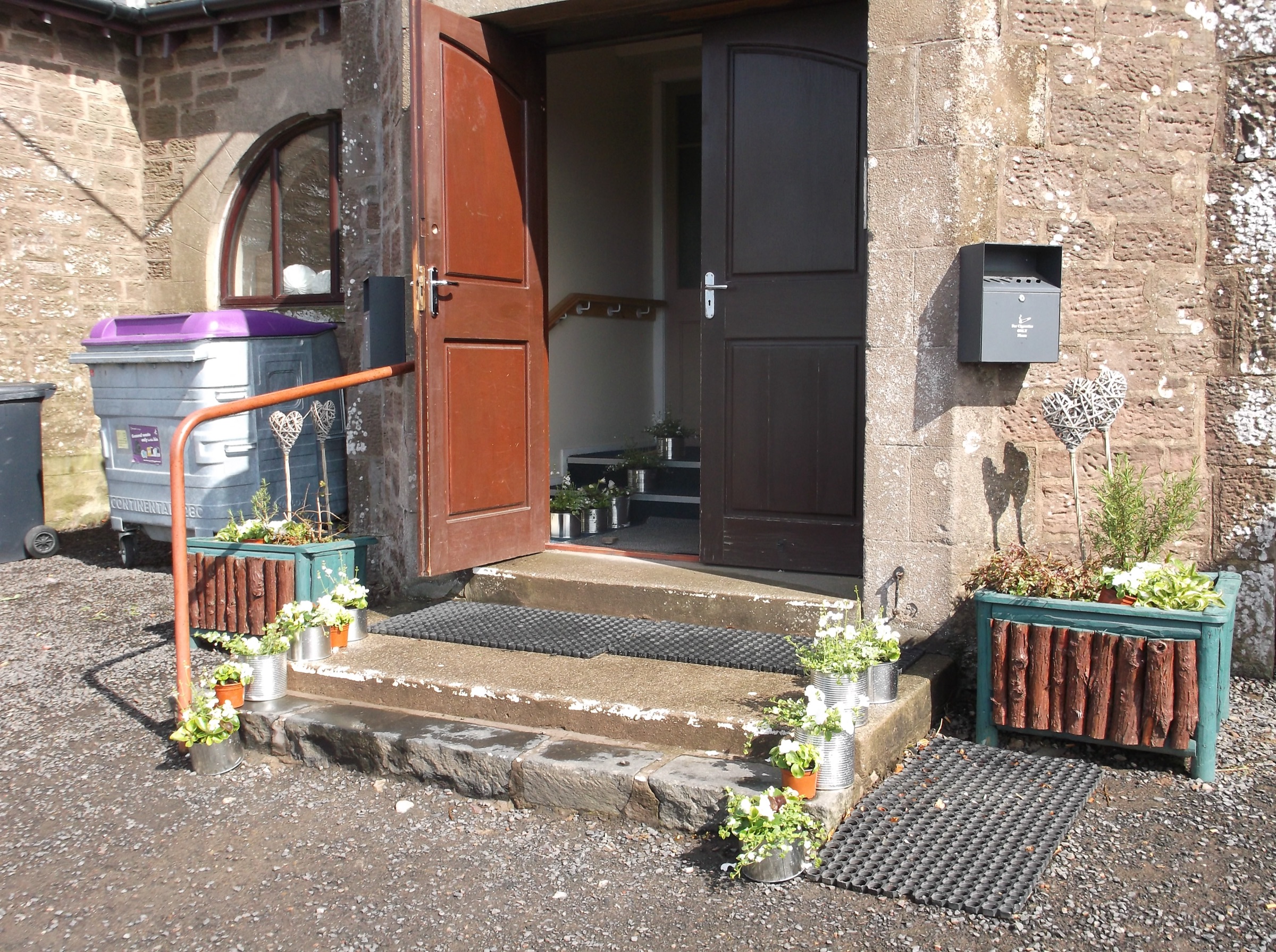 Floral display by entrance